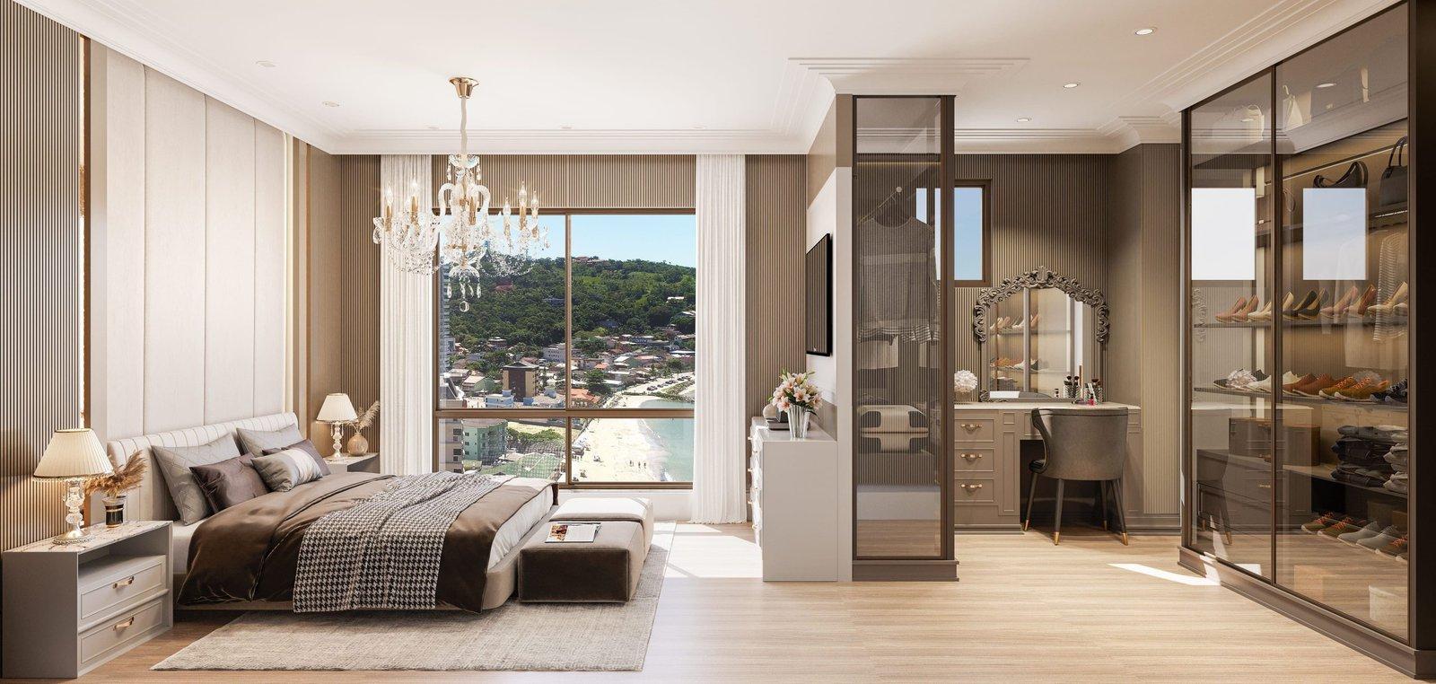 Suíte de um apartamento do George VI Residencial, com closet e vista para a orla