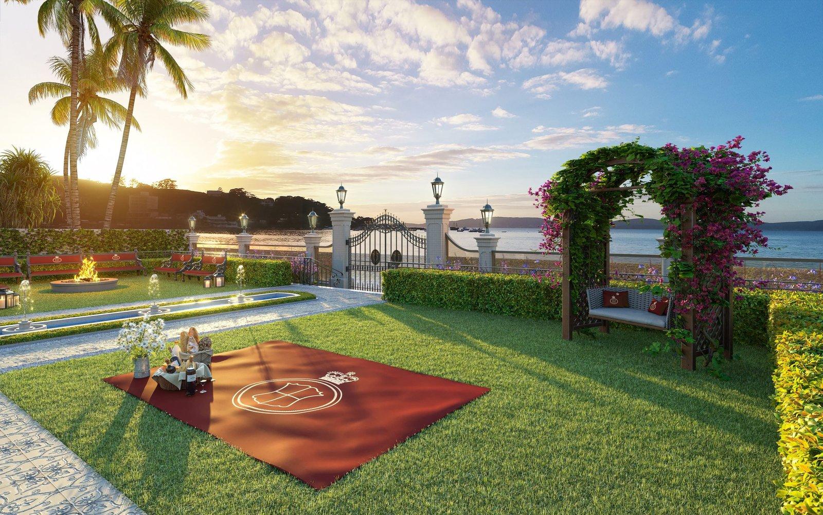 Jardim do George VI Residencial ao entardecer, com portão de acesso direto à praia